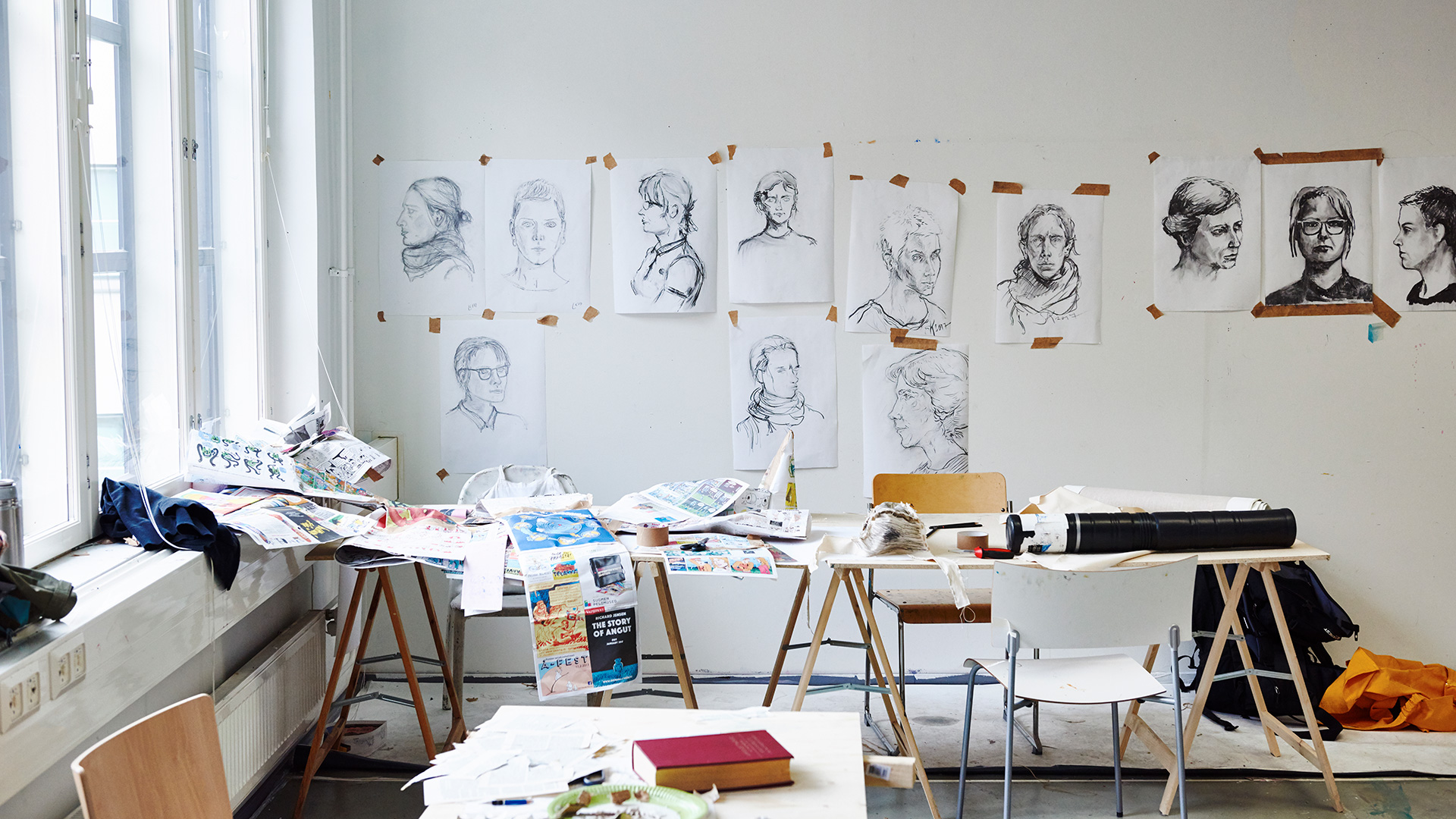 Drawings on a wall in a studio space