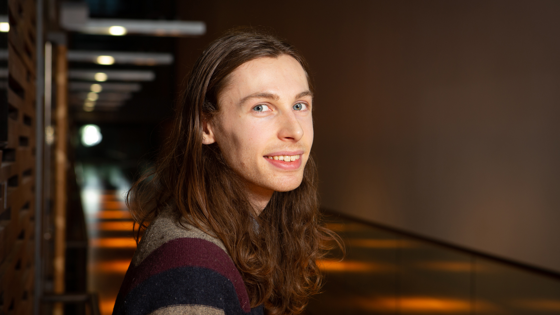 Student at the Music Centre of Helsinki looks over his shoulder.