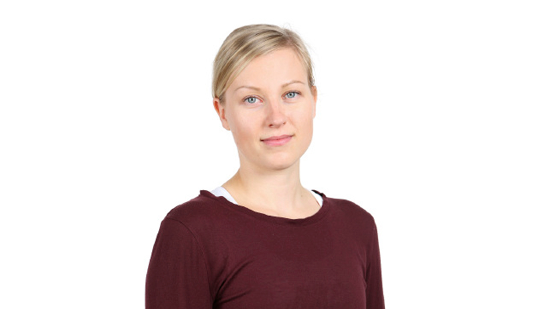 Suvi Kelloniemi katsoo suoraan kameraan.