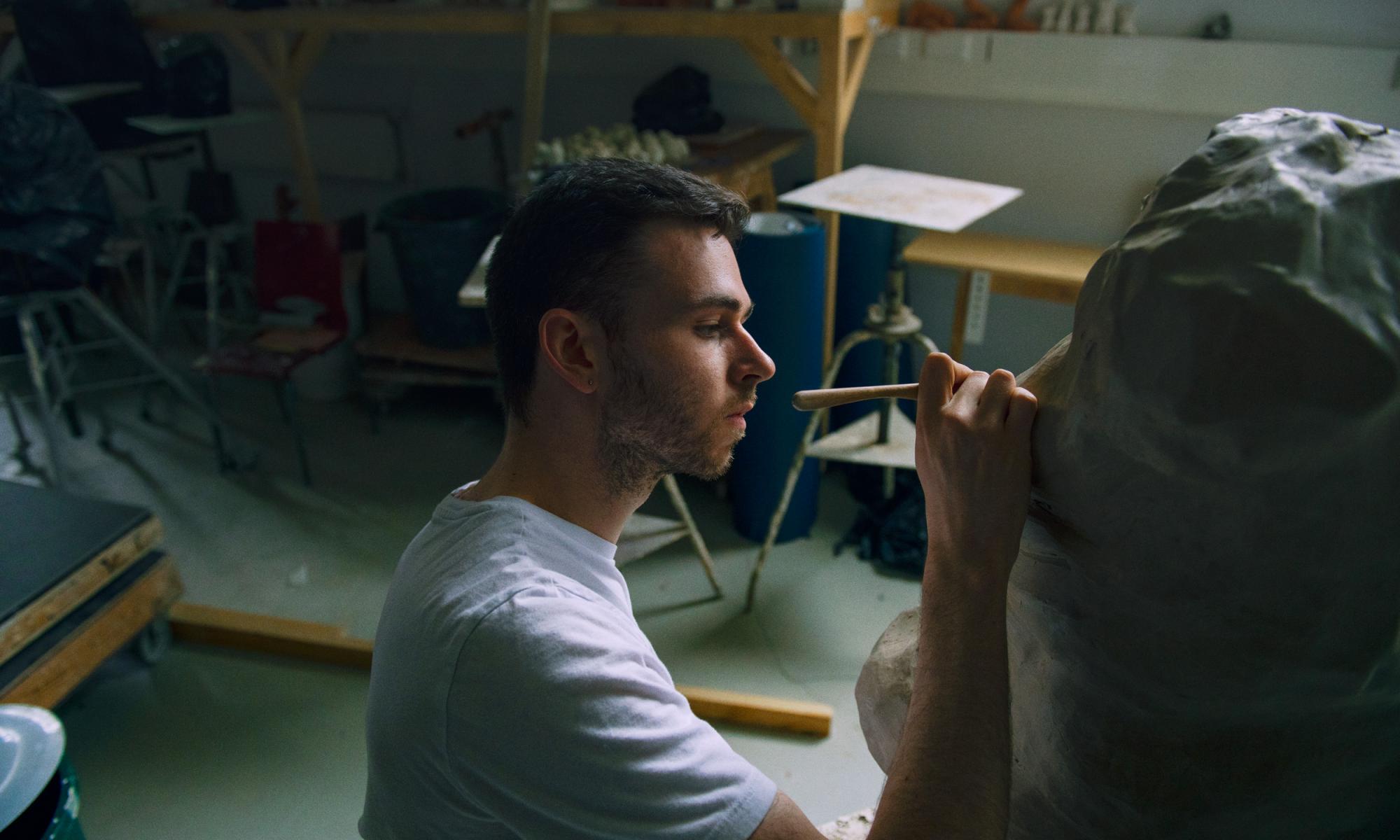 person working in sculpture studio