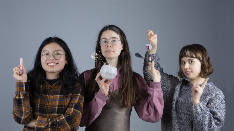Three Academy of Fine Arts student ambassadors posing.